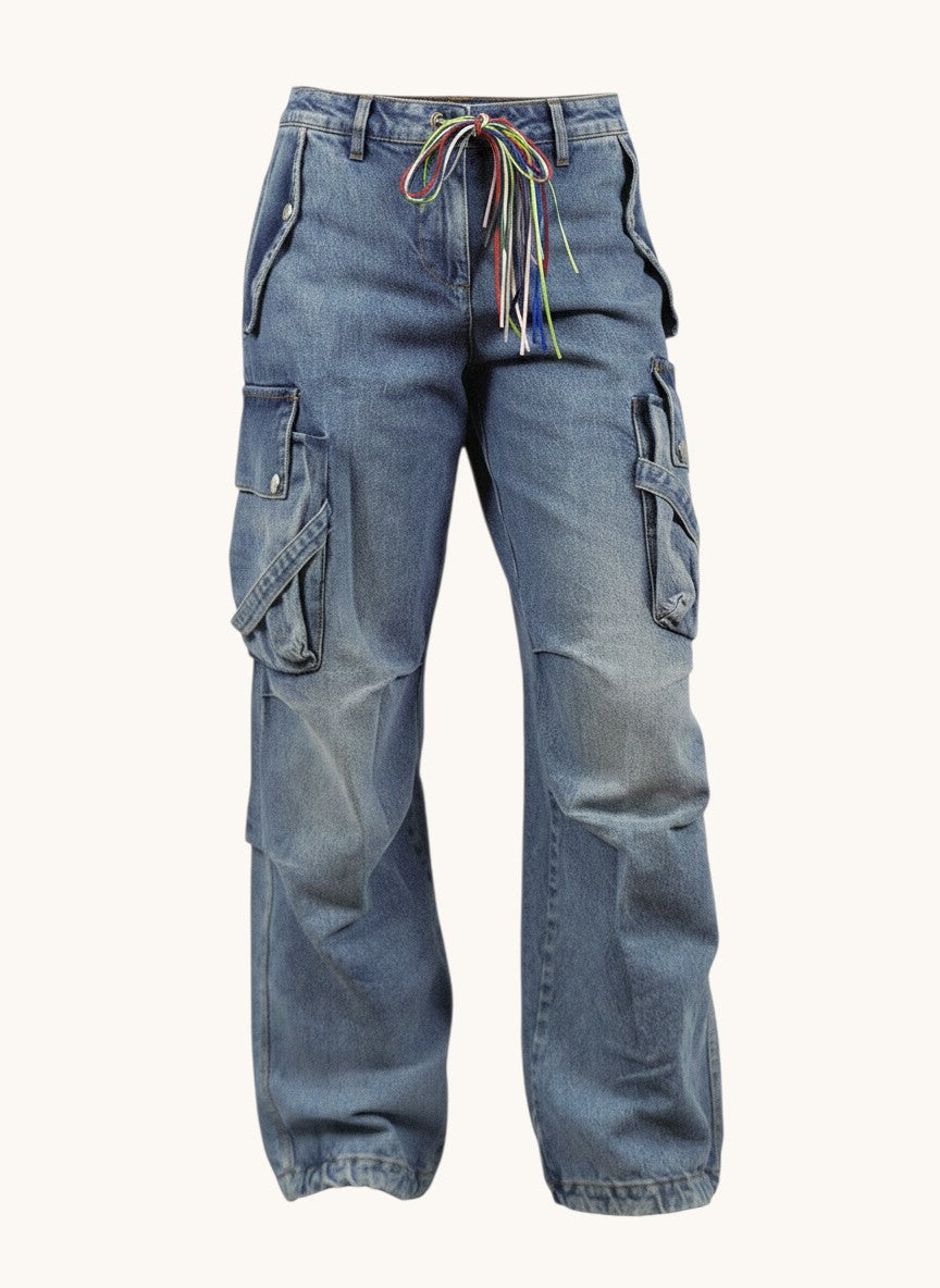 Numero 5 women's baggy blue denim jeans, 100% cotton, with cargo pockets and belt loops. Features colorful drawstring detail.