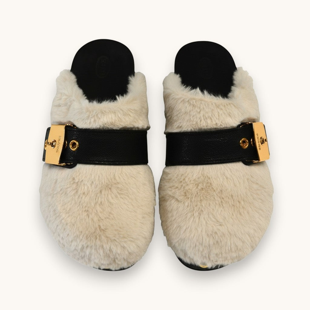 Numero 5 beige faux fur clogs with black leather strap and gold buckle detail.