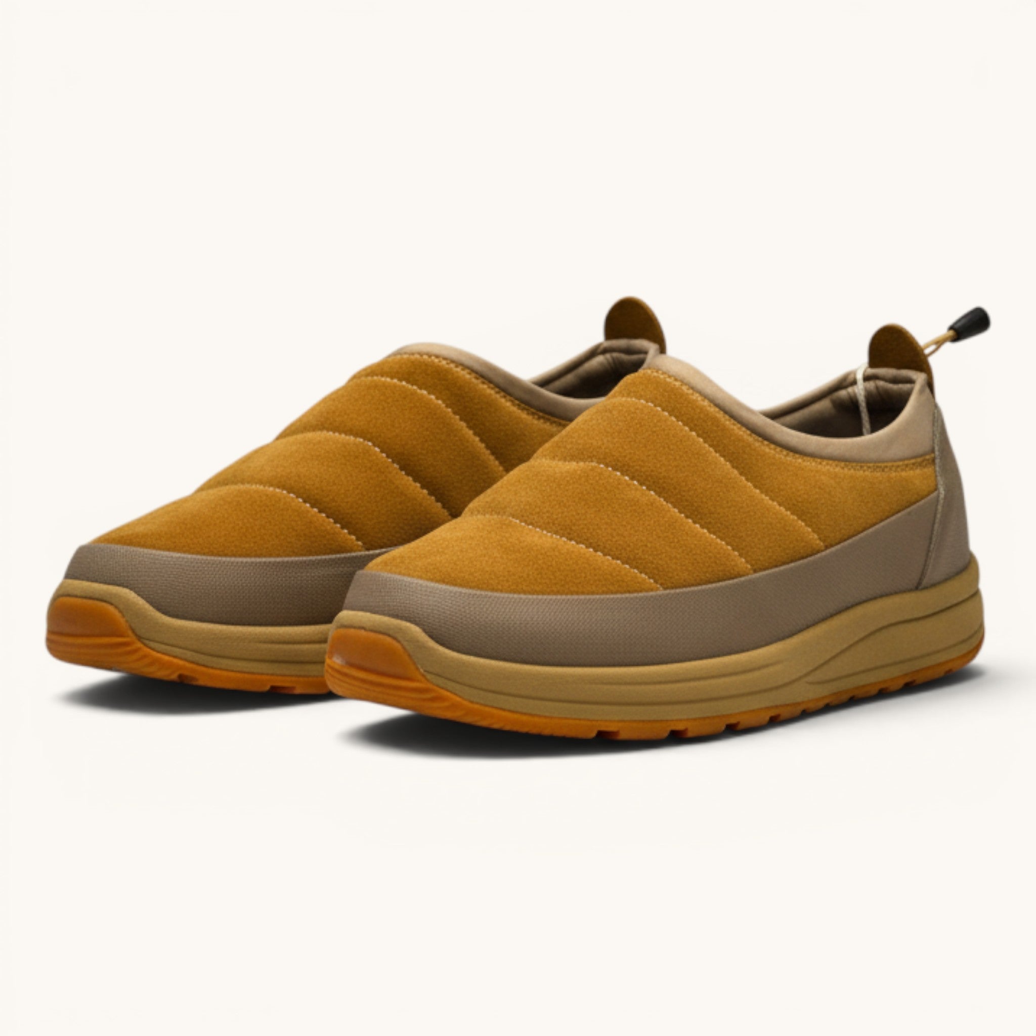 Numero 5 beige suede quilted slip-on shoes with tan sole and grey trim.