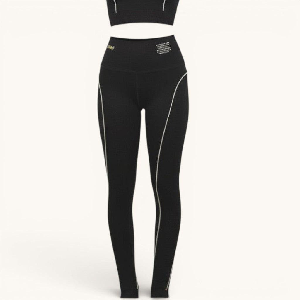 Numero 5 black polyamide and elastane activewear set with white piping and MSGM logo details.