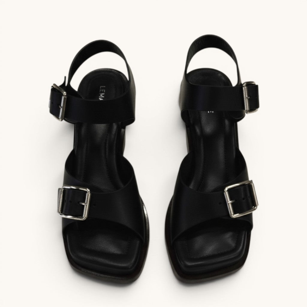 Numero 5 Lemaire black leather sandals with silver buckles and ankle strap.