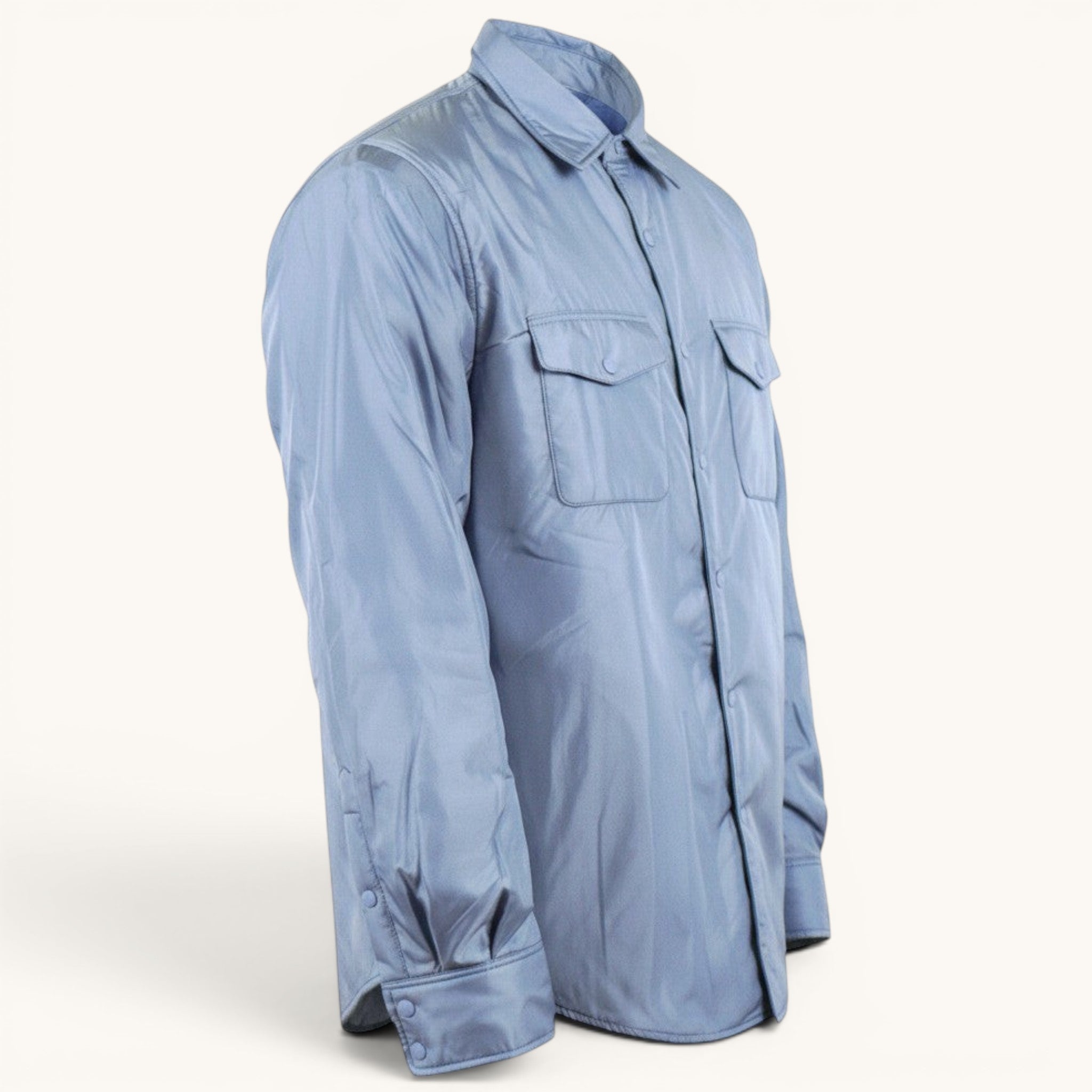 Numero 5 light blue nylon shirt with two chest pockets and button cuffs.