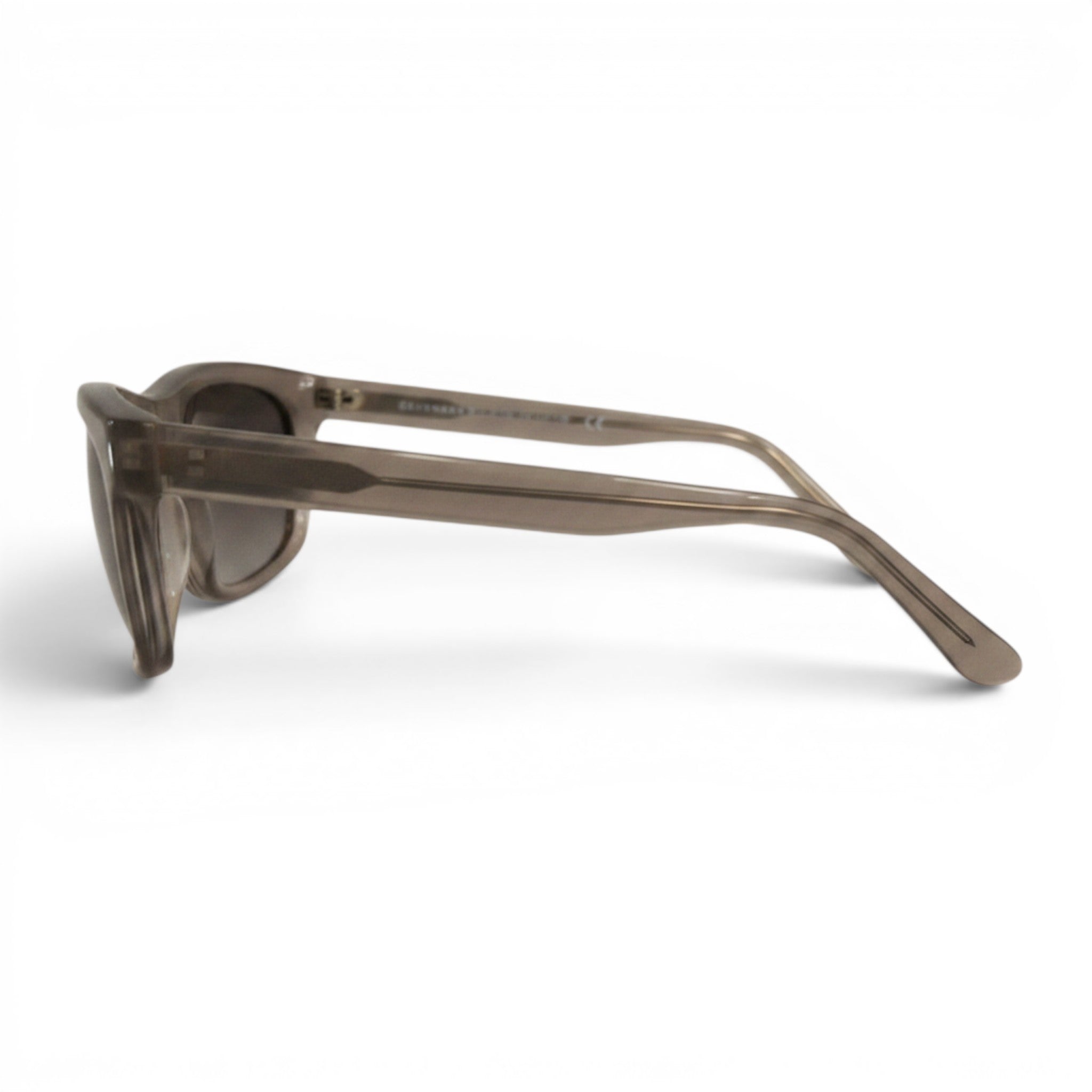 Numero 5 Occhiali Our Legacy 113078, montatura in acetato grigio traslucido, lenti sfumate grigie, design minimalista, taglia unica.
