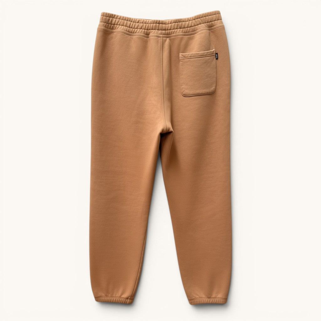 Numero 5 Stussy beige cotton sweatpants with a regular fit and a comfortable, durable structure. Features a back pocket.