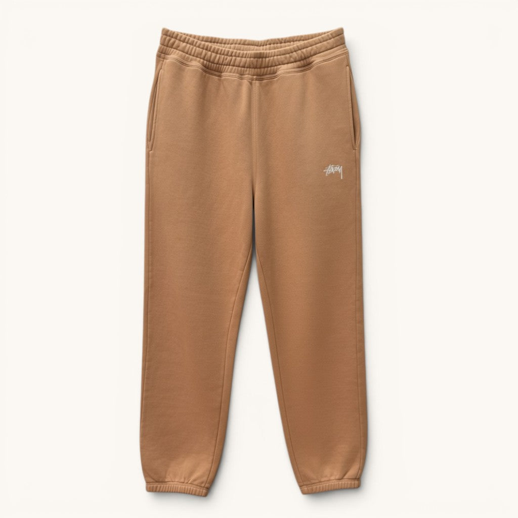 Numero 5 beige Stussy sweatpants for men, 100% cotton, regular fit, comfortable and durable design.