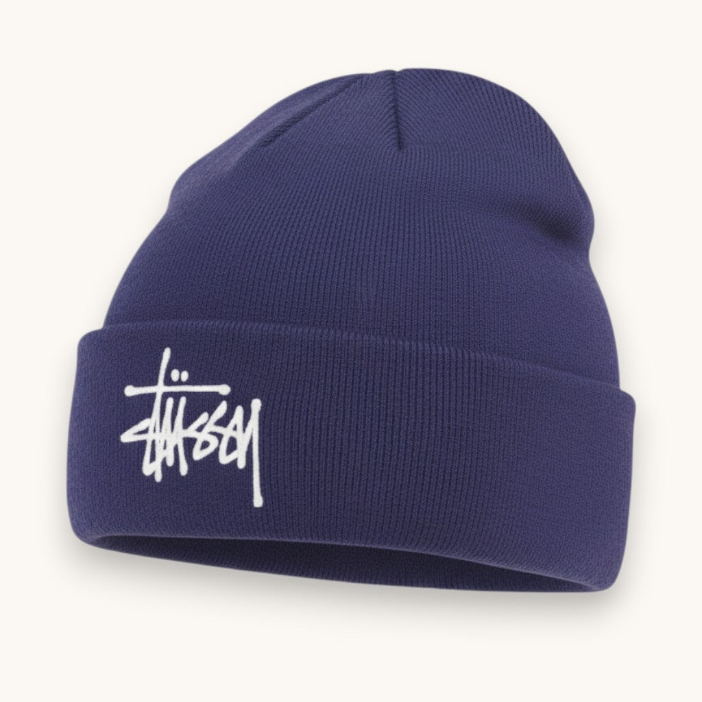 Numero 5 Stussy dark purple acrylic beanie with white embroidered logo, streetwear style.