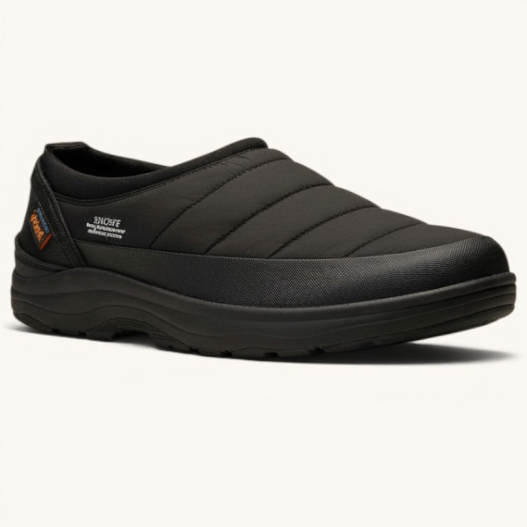 Numero 5 Suicoke black quilted slip-on shoes with durable sole and orange logo detail.