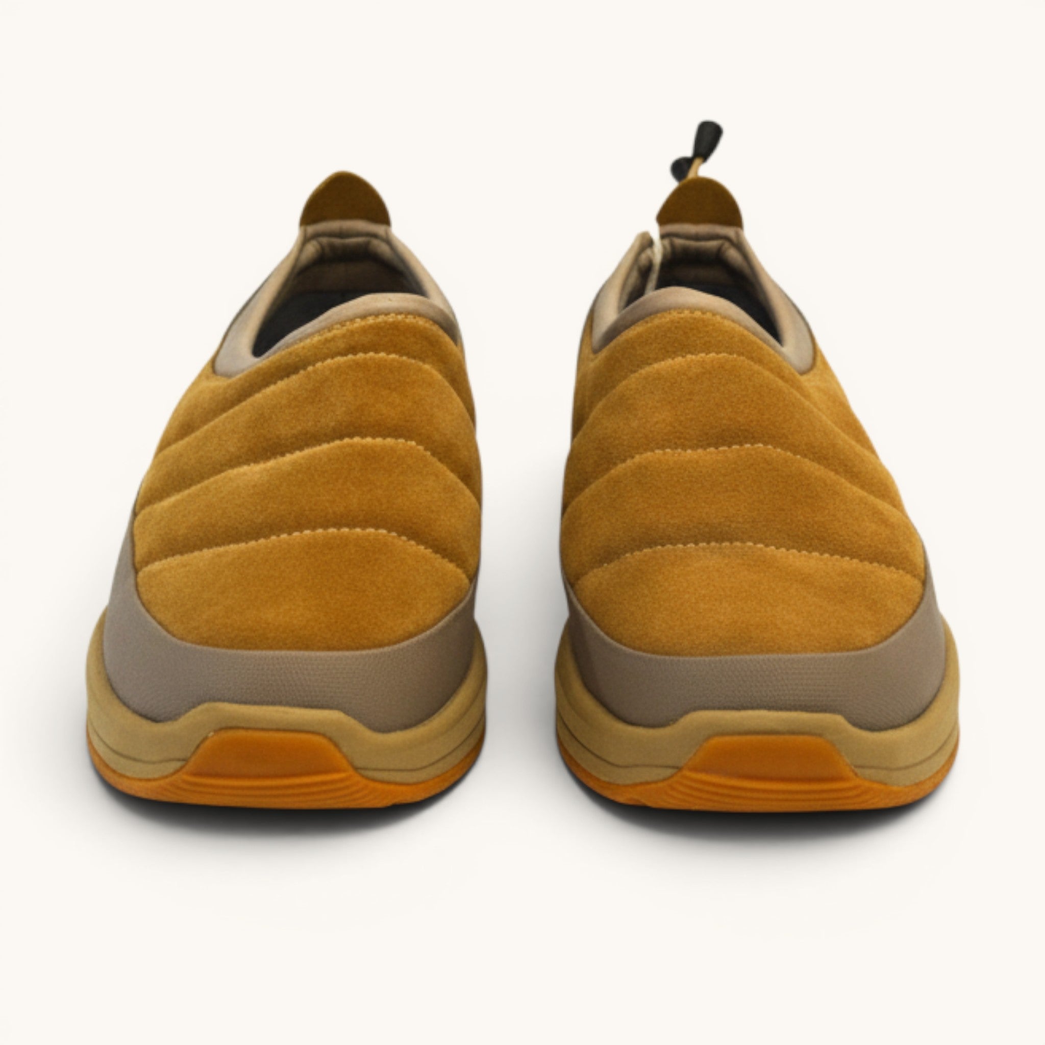 Numero 5 beige suede quilted slip-on shoes with rubber sole and 3M Thinsulate tag.