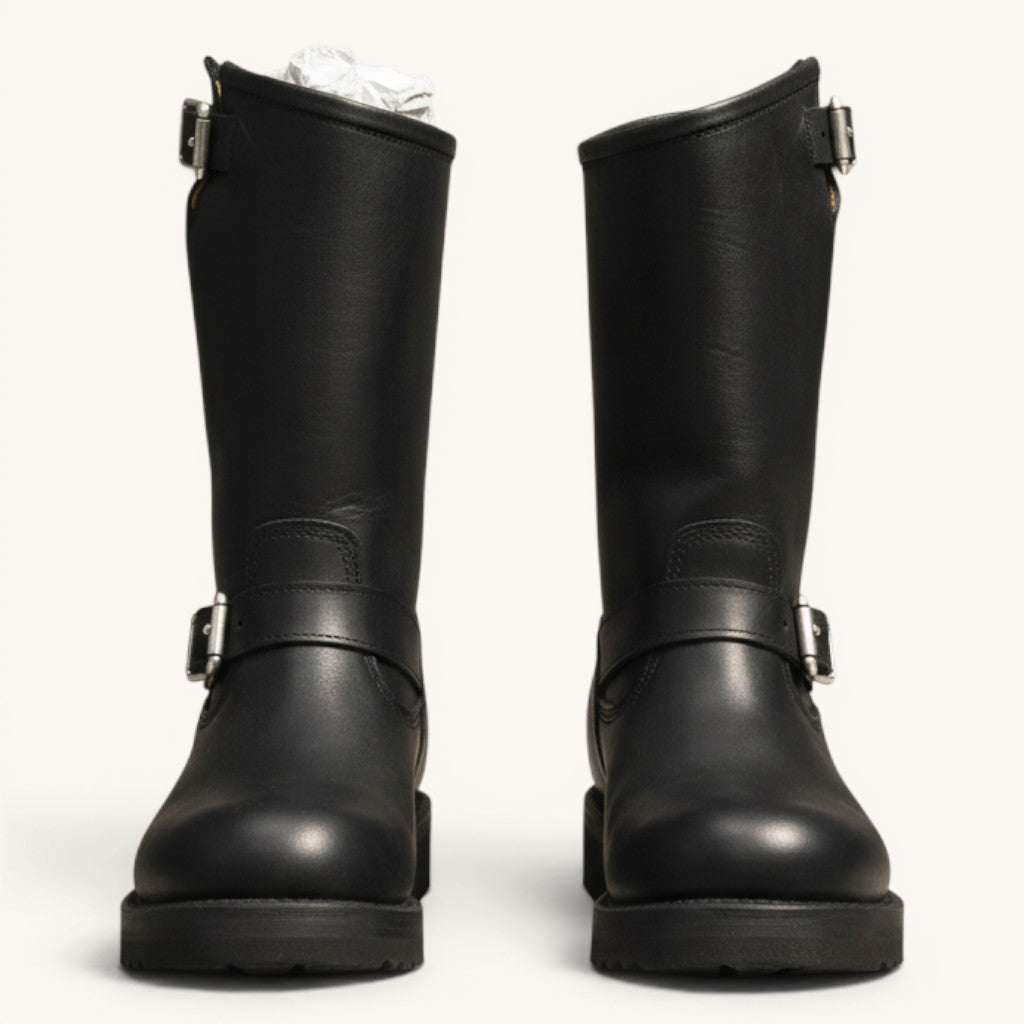 Numero 5 black leather biker boots with buckle detail and thick sole. Style 112157.