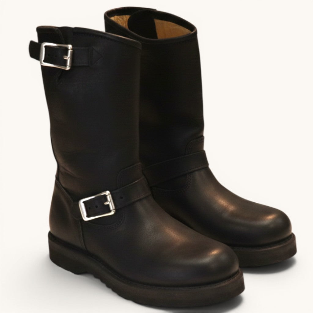 Numero 5 black leather biker boots with silver buckle detail and lug sole.
