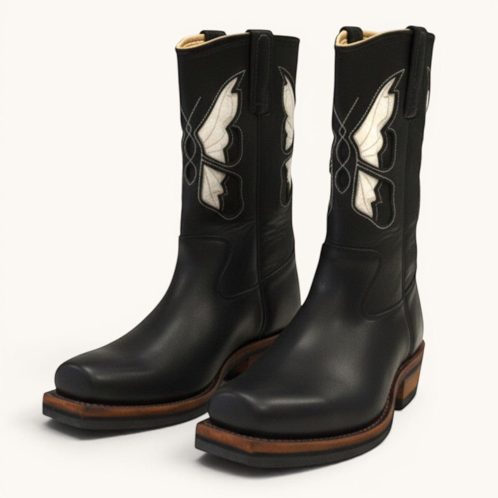 Numero 5 black leather square toe cowboy boots with white stitching details on the shaft.