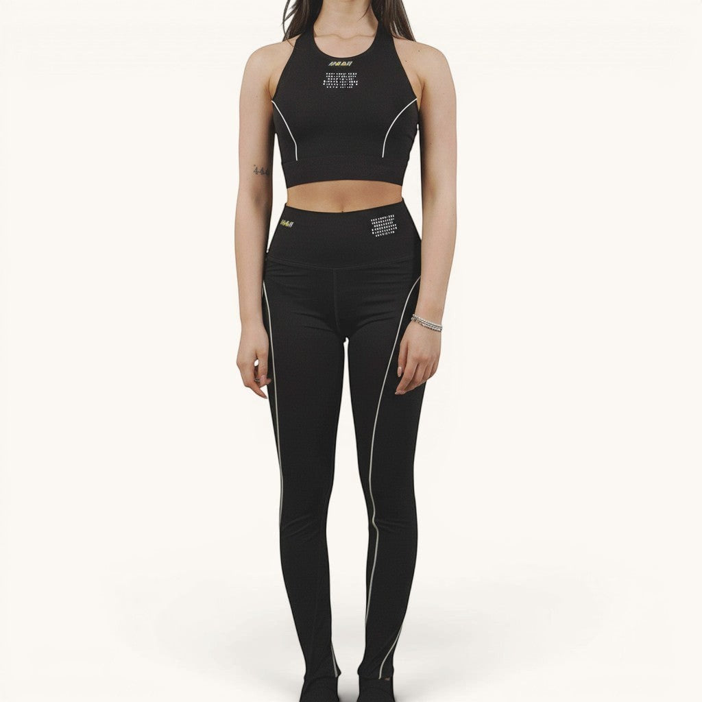 Numero 5 black polyamide elastane leggings with white piping and MSGM active logo detail.