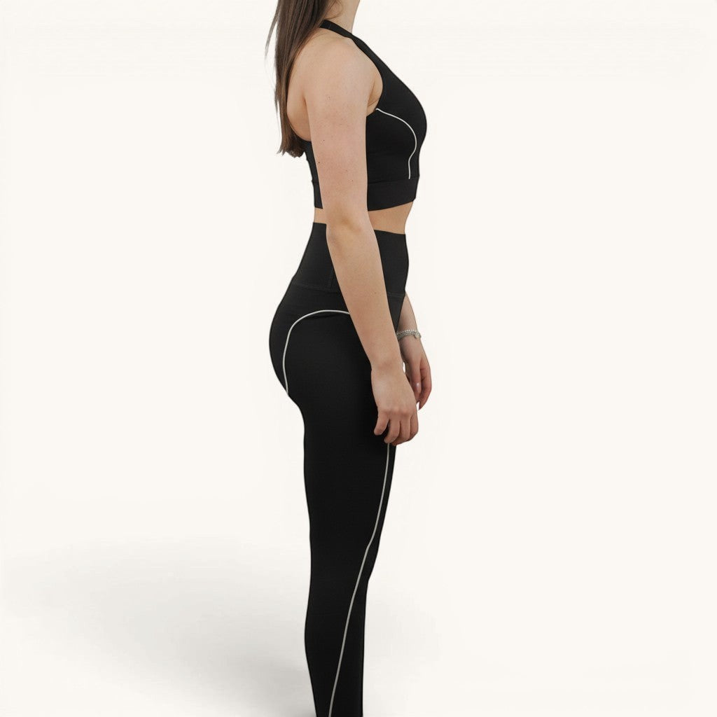 Numero 5 women's black polyamide-elastane leggings with white piping detail and MSGM active logo.
