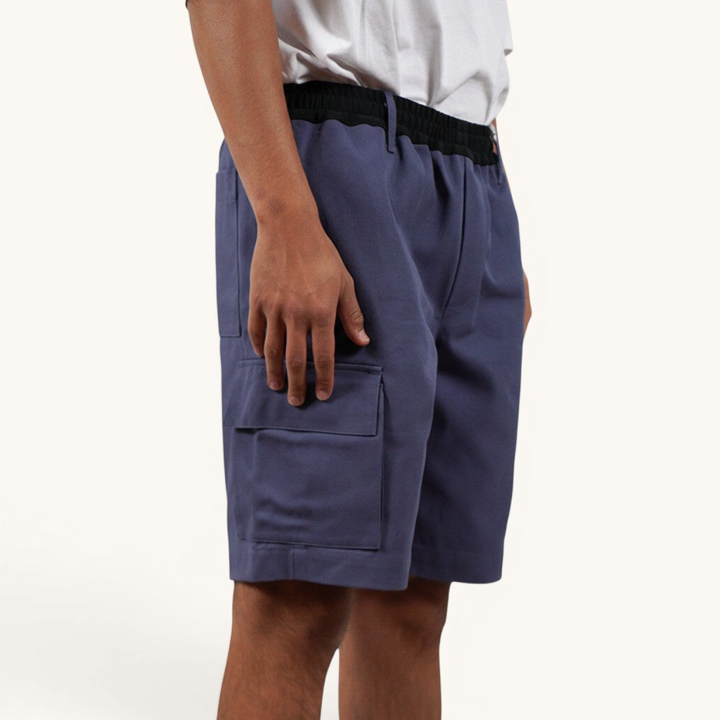 Numero 5 men's blue technical cargo shorts, above the knee length, regular fit, made from polyamide and elastane blend.