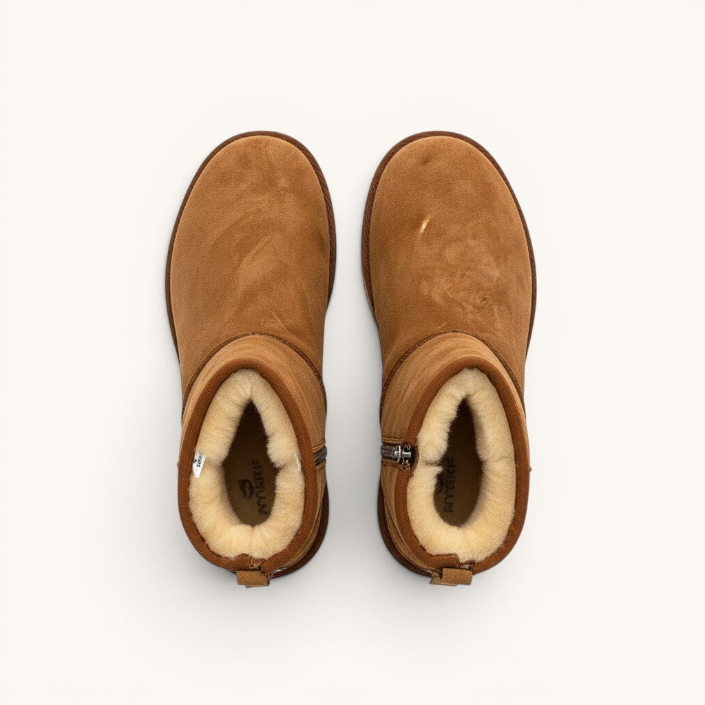 Numero 5 brown suede boots with fluffy sheepskin lining and zipper detail.