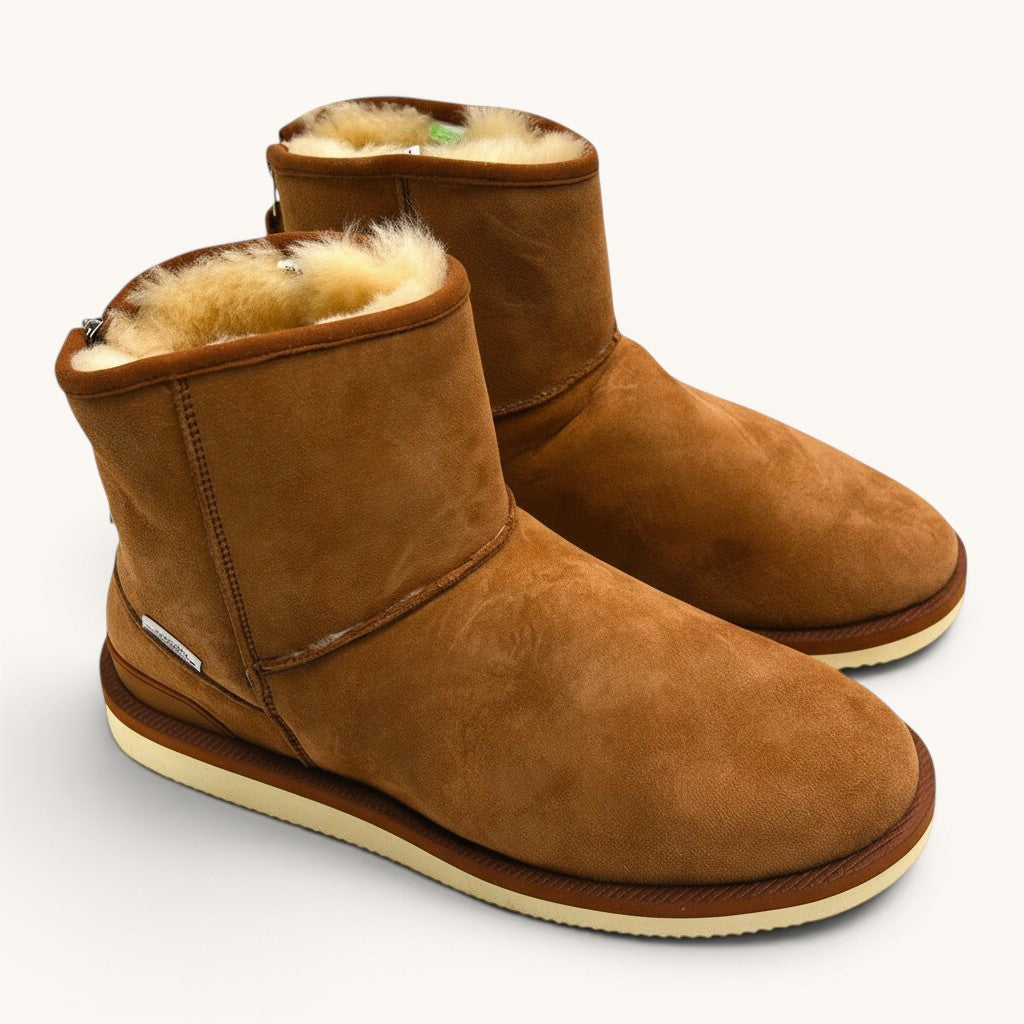Numero 5 brown suede boots with fluffy sheepskin lining and zipper detail.
