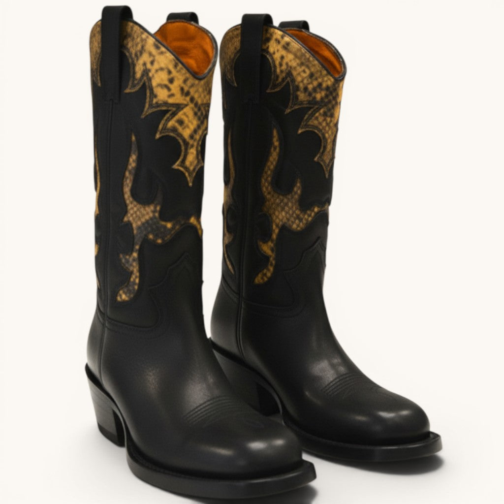 Numero 5 Dries Van Noten black leather cowboy boots with orange snake print lining and detailing.