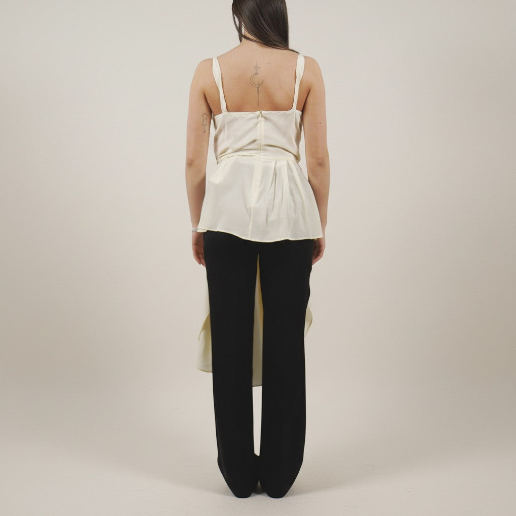 Numero 5 ivory silk draped top with elongated back detail and spaghetti straps.