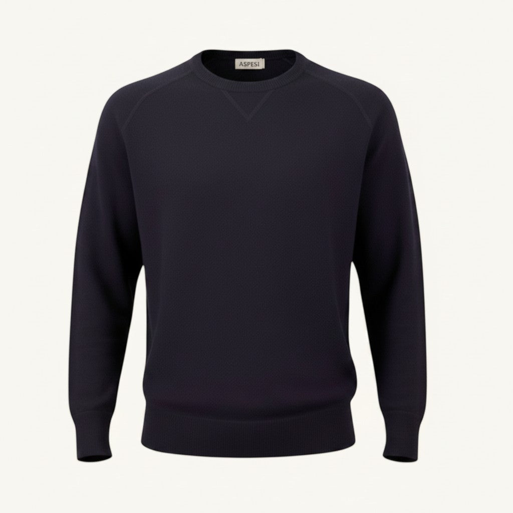 Numero 5 Men's dark blue 100% wool crewneck sweater with raglan sleeves and a minimal design. Comfortable fit for winter.