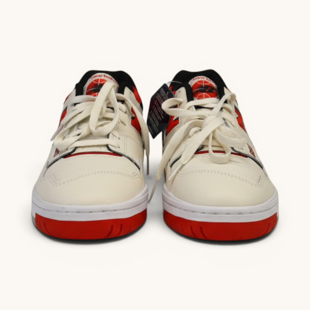 Numero 5 New Balance cream and red leather low-top sneakers with white laces and perforated toe box.