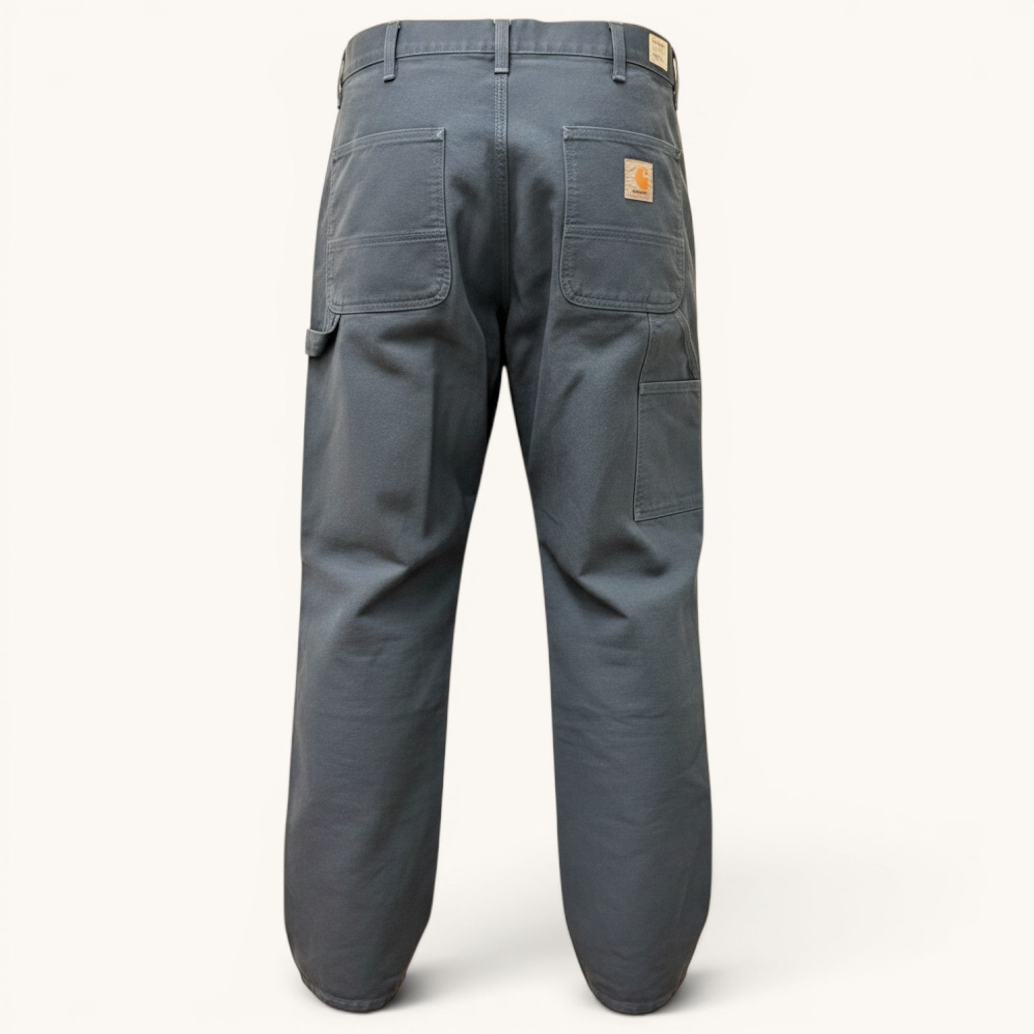 Numero 5 pantaloni blu Carhartt WIP in cotone, regular fit, con tasche funzionali e design workwear.