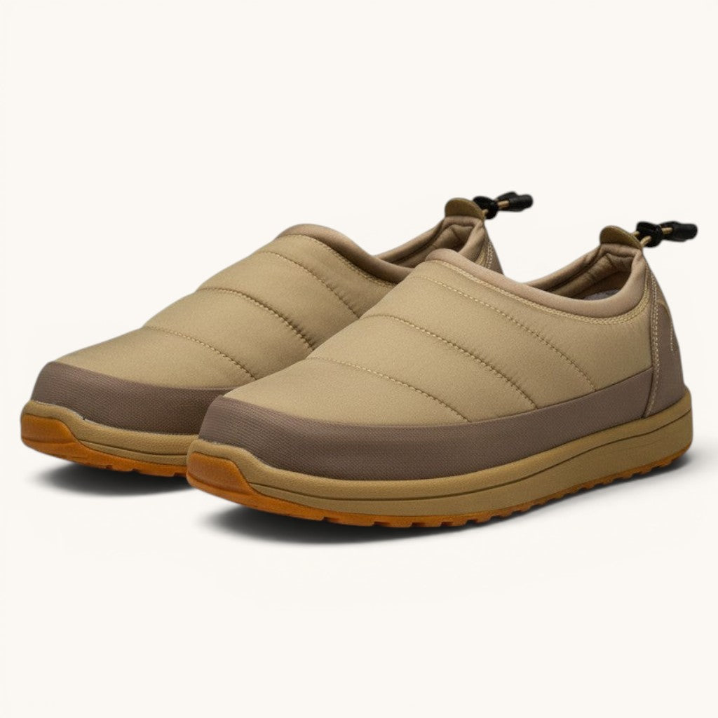 Numero 5 Scarpa beige quilted slip-on shoes with toggle closure and rubber sole.
