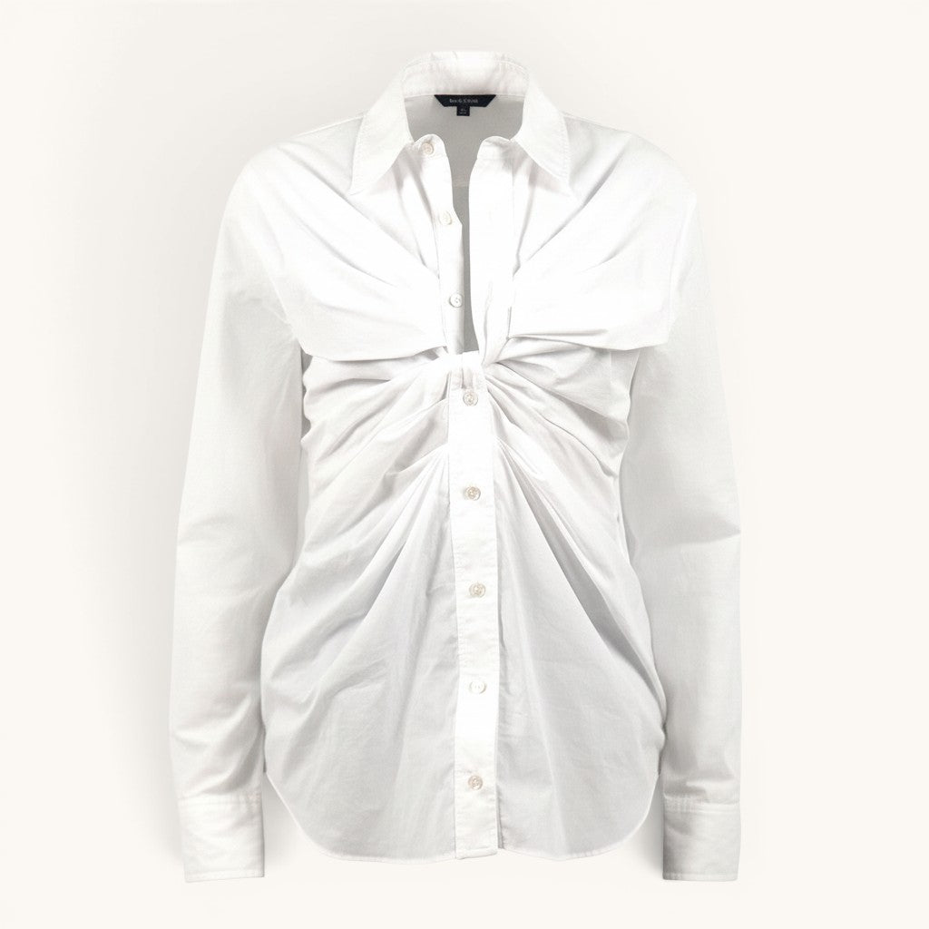 Numero 5 white cotton shirt with a deep round neckline and button details, featuring a ruched front design.