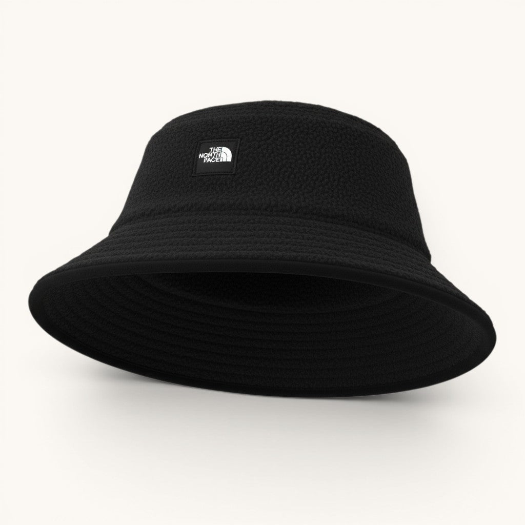 Numero 5 black fleece bucket hat with The North Face logo patch. Suitable for all seasons.