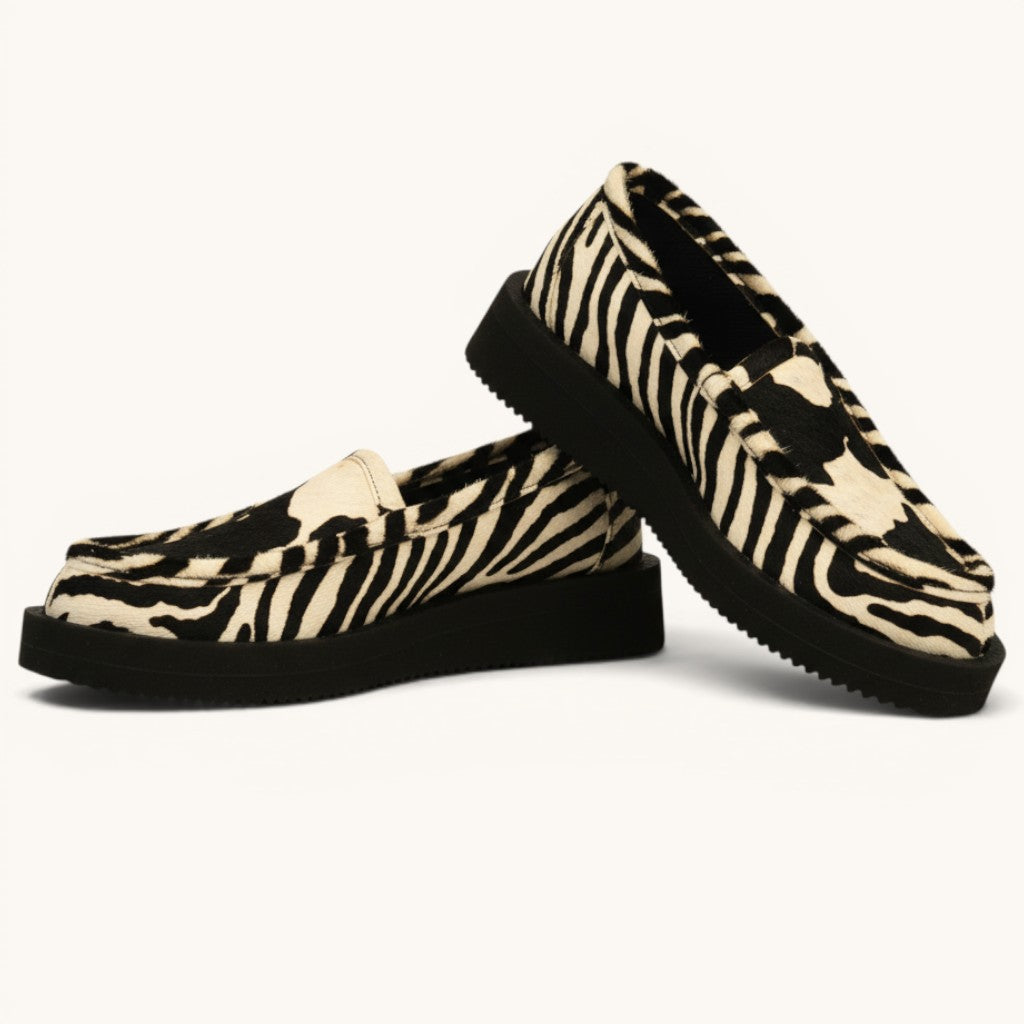 Numero 5 black and white cow print and zebra print platform loafers. Genuine leather.