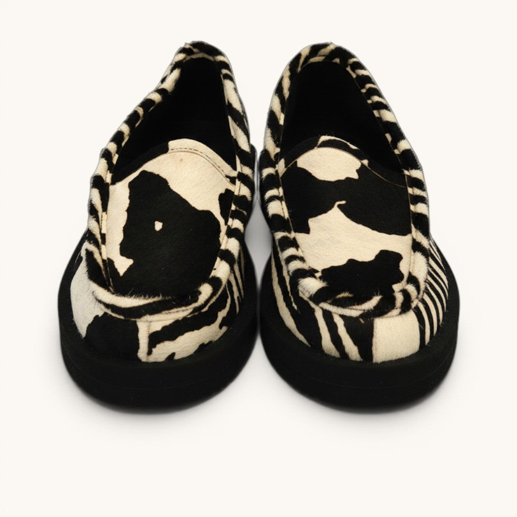 Numero 5 black and white zebra print calf hair loafers with platform sole.